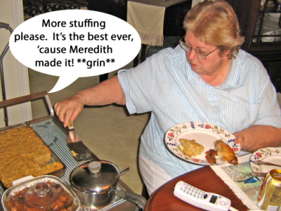 Meredith made the stuffing.  Mom dishes it up.